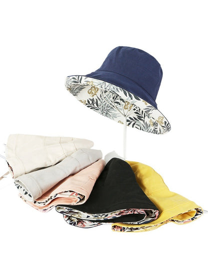 Haila reversible bucket hat with colorful floral pattern on fabric