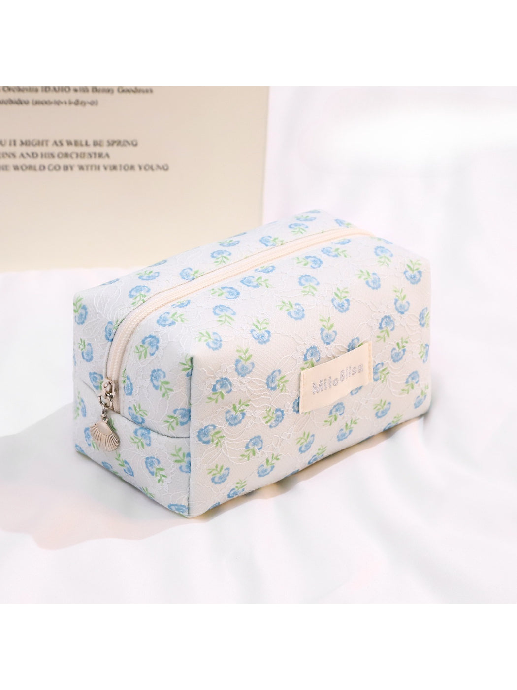 Cosbai travel cosmetic bag standing upright with bright printed pattern