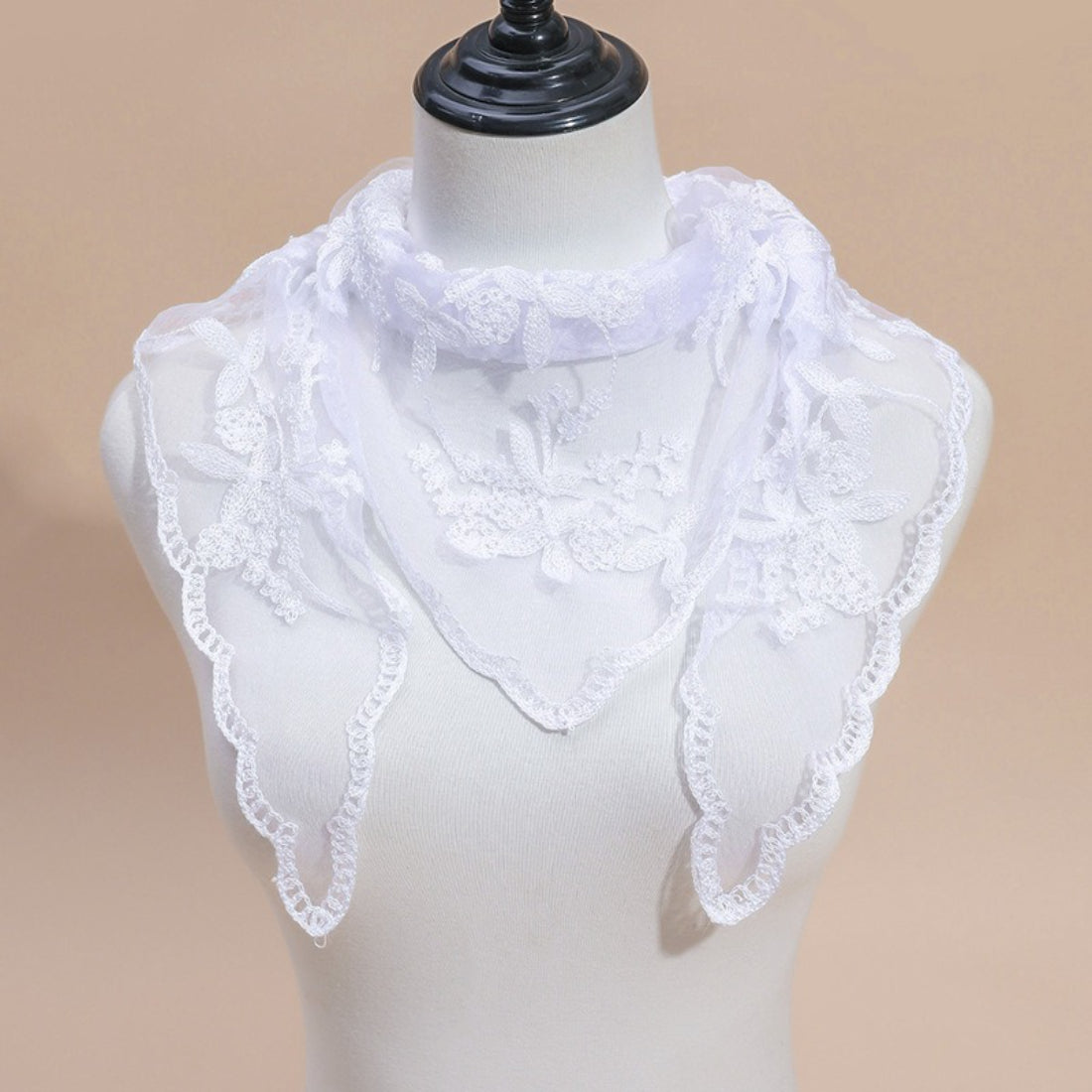 Model wearing Haila embroidered lace veil head scarf styled over hair