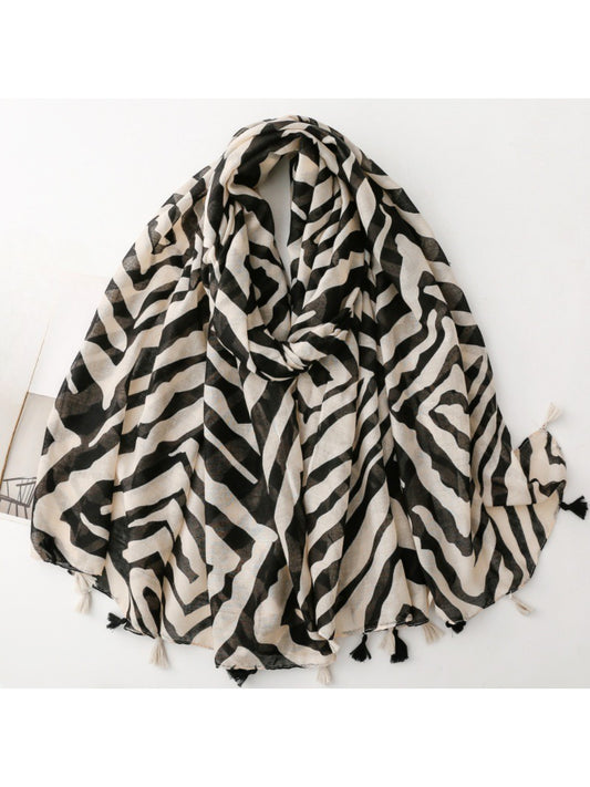 Scarvii Zebra Stripe Tassel Scarf folded showing black and white zebra pattern with tassels
