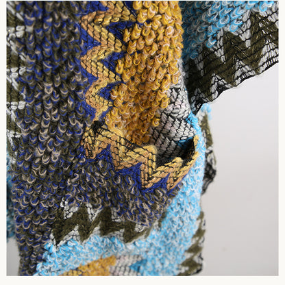 Close-up of Scarvii boho shawl with pocket focusing on fabric and design elements