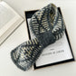 Scarvii - Two-Tone Knitted Scarf with Slip-Through Design