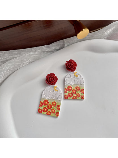 Earwish Rose Garden drop earrings displayed on a white background highlighting floral design