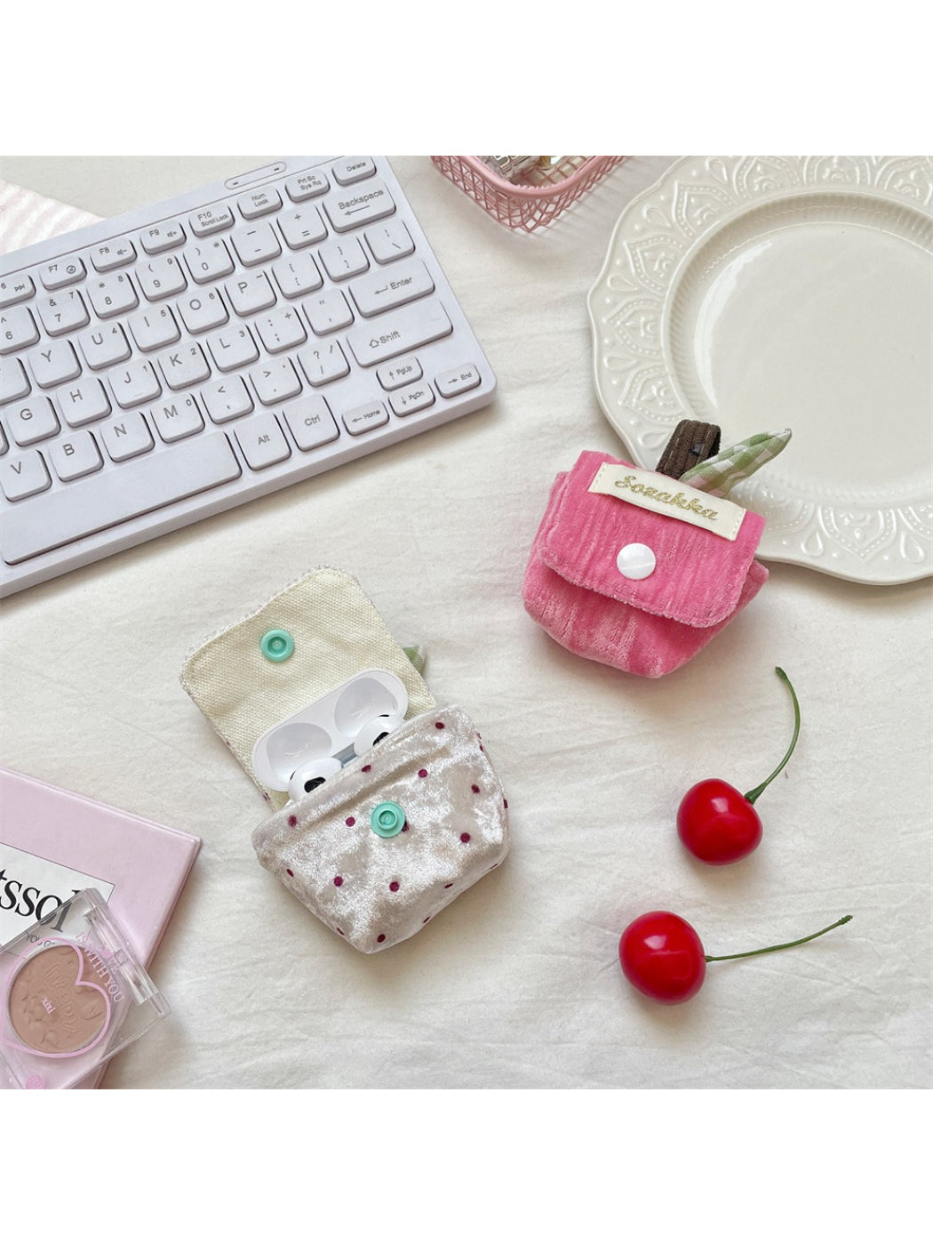Cosbai plush mini earbuds pouch bag held in hand showing its compact size