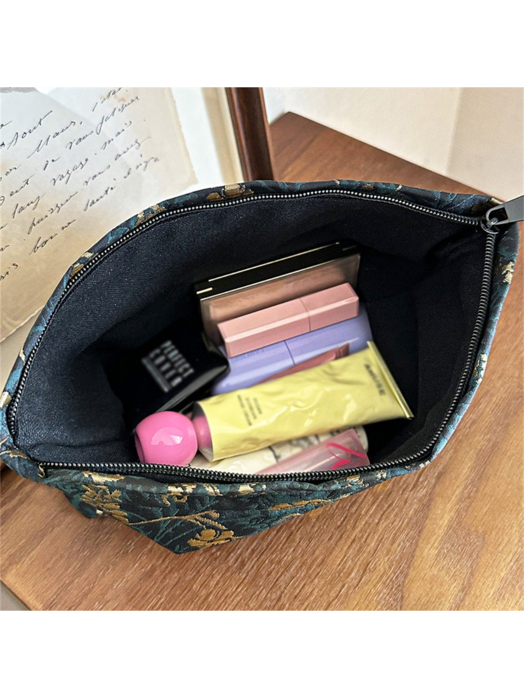 Cosbai dark floral cosmetic bag displayed with a matching floral pattern