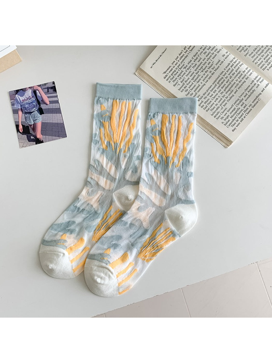 Top view of Rufia modern floral mixed crew socks laid out to display full floral design
