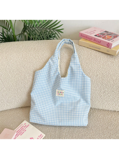 Side view of Cosbai slouchy tote bag highlighting its spacious interior