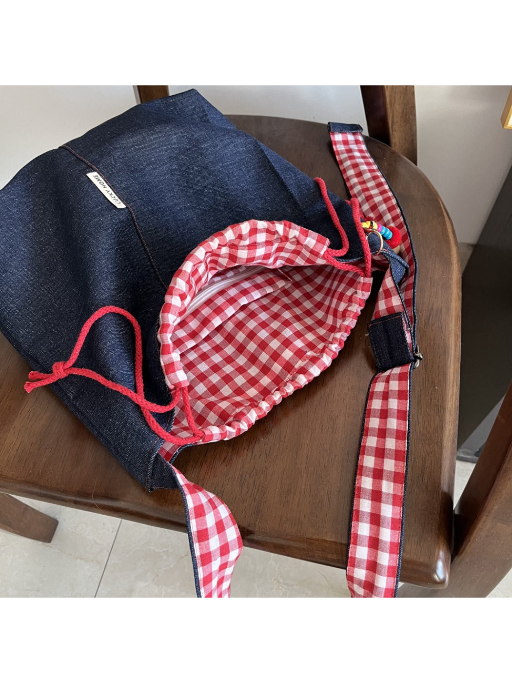 Cosbai bucket bag interior showing spacious compartment and lining