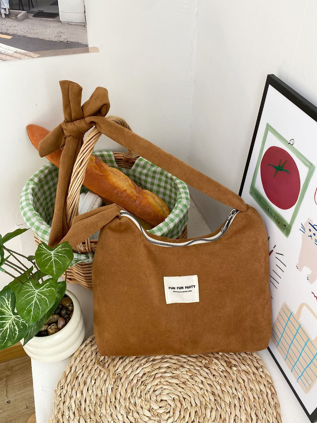 Side view of Cosbai slouchy shoulder bag highlighting its relaxed shape