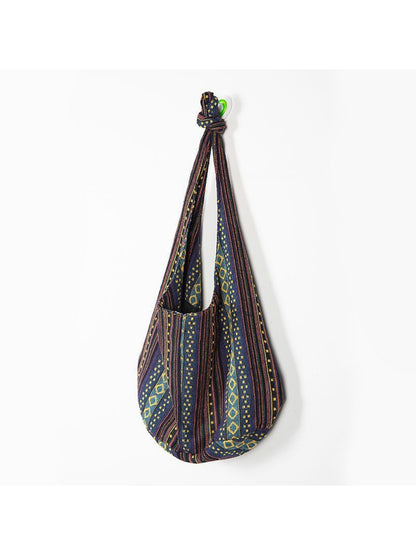 Cosbai striped slouchy crossbody bag displayed on a plain background
