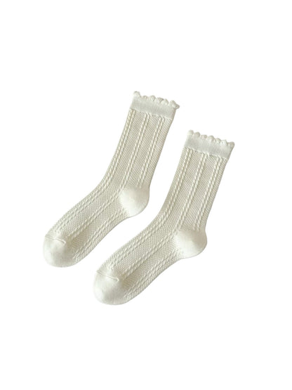 Model wearing Rufia soft diamond pattern socks with casual shoes