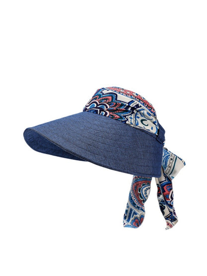 Model wearing Haila boho print open top hat outdoors in natural light