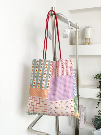 Side view of Cosbai floral patchwork tote bag highlighting its spacious interior