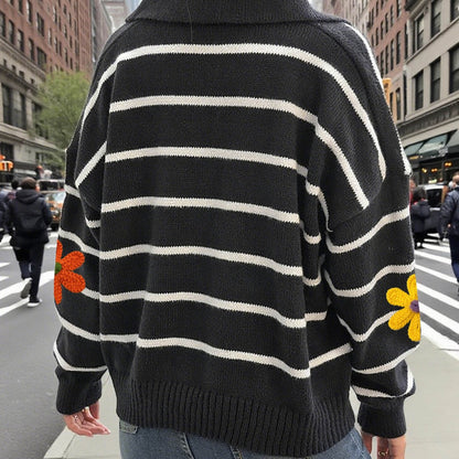 Crosa Colorblock Flower Polo Sweater showing color block detail and floral motif