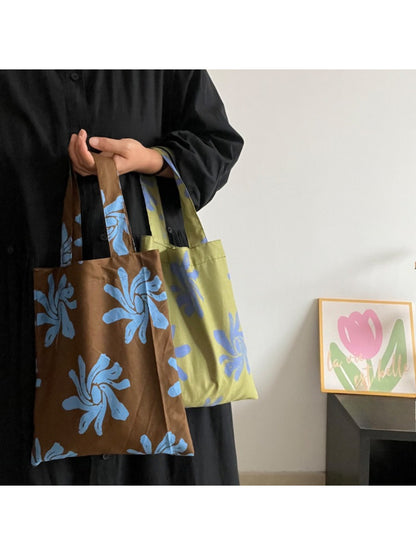Close-up of abstract floral pattern on Cosbai reusable tote bag showing vibrant colors