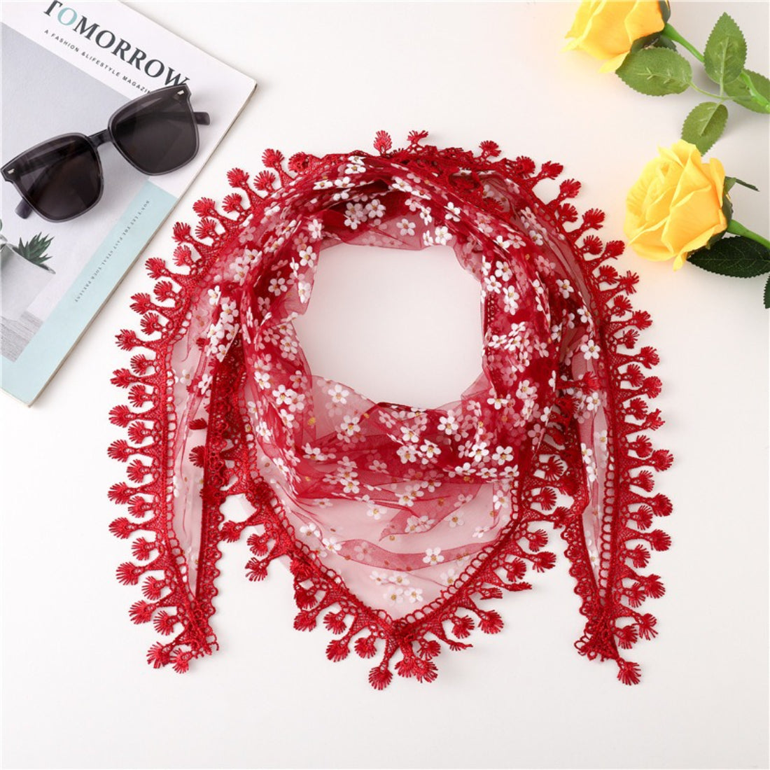 Model styling Haila Daisy Lace Triangle Veil Scarf as a neck scarf with floral lace pattern