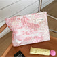 Close-up of Cosbai pink floral cosmetic bag showing detailed floral design