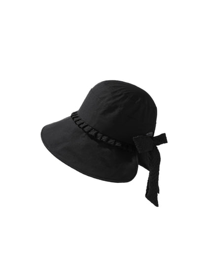 Close-up of woven texture and tie back strap on Haila summer hat