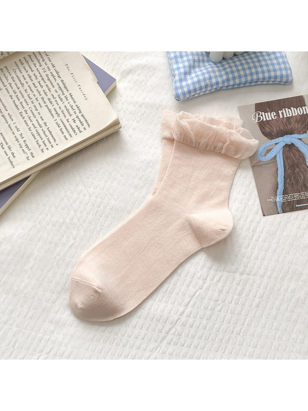 Model wearing Rufia soft frill trim crew socks with casual shoes