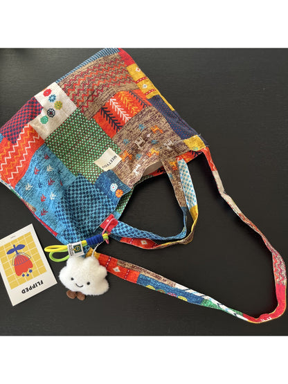 Cosbai tote bag with patchwork design displayed on white background, showing front view