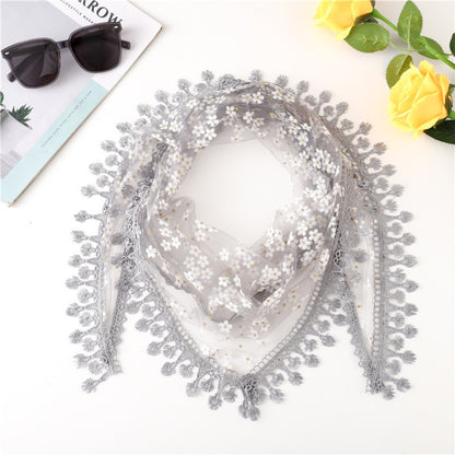 Haila Daisy Lace Triangle Veil Scarf styled as a headscarf on model with visible lace edges