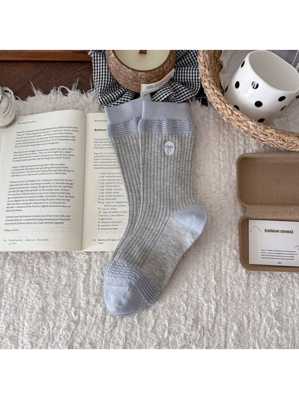Side view of Rufia embroidered ribbon ribbed slouch socks worn with casual shoes