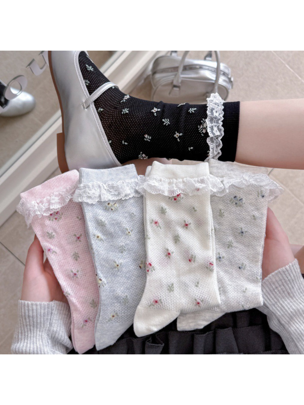 Pair of Rufia Romantic Lace Cuff Crew Socks in soft pink with delicate lace trim
