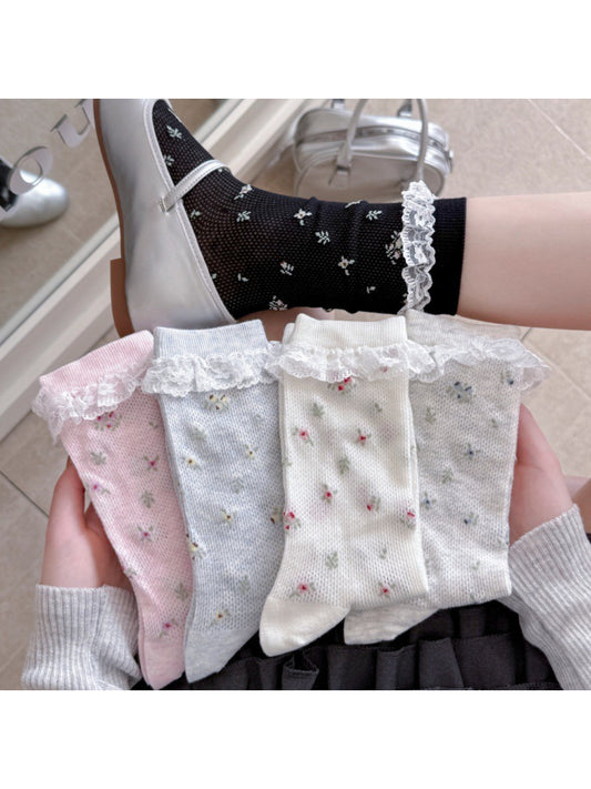 Pair of Rufia Romantic Lace Cuff Crew Socks in soft pink with delicate lace trim