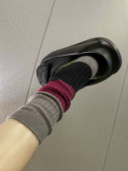 Flat lay of Rufia bold colorblock ribbed crew socks showing full length and ribbed texture