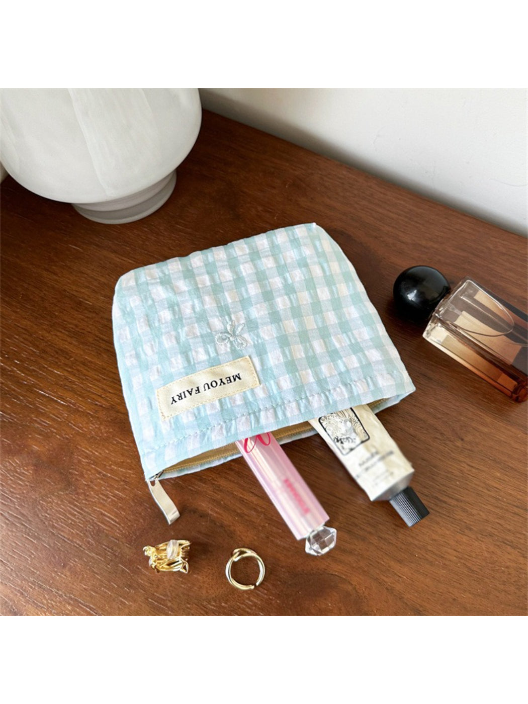 Cosbai pastel check zip pouch angled to show zipper and check pattern