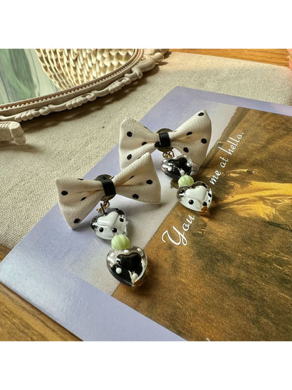 Earwish Heart Charm Bow Earrings displayed on white background showing front view