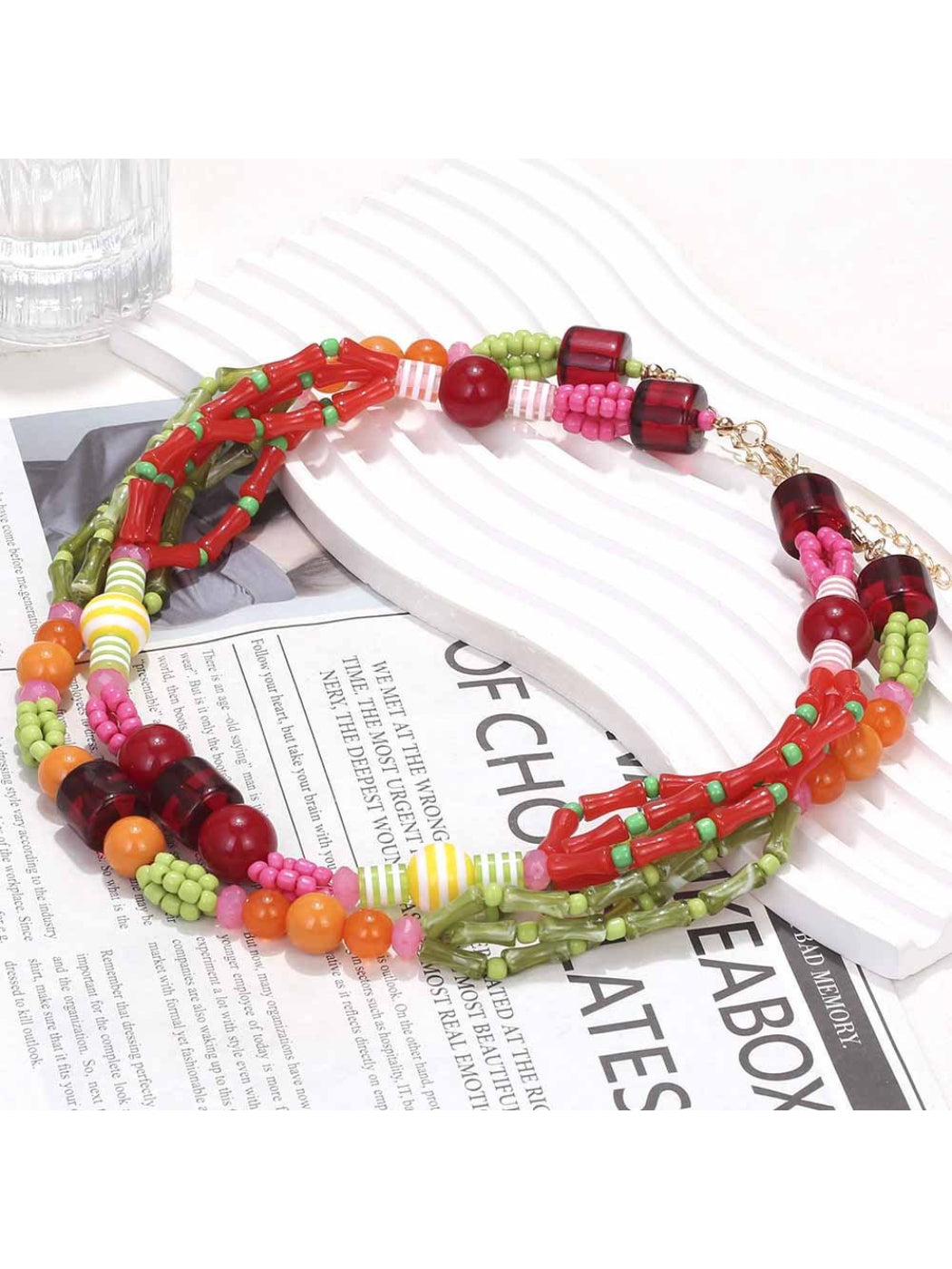 Model wearing the colorful layered beaded necklace for summer