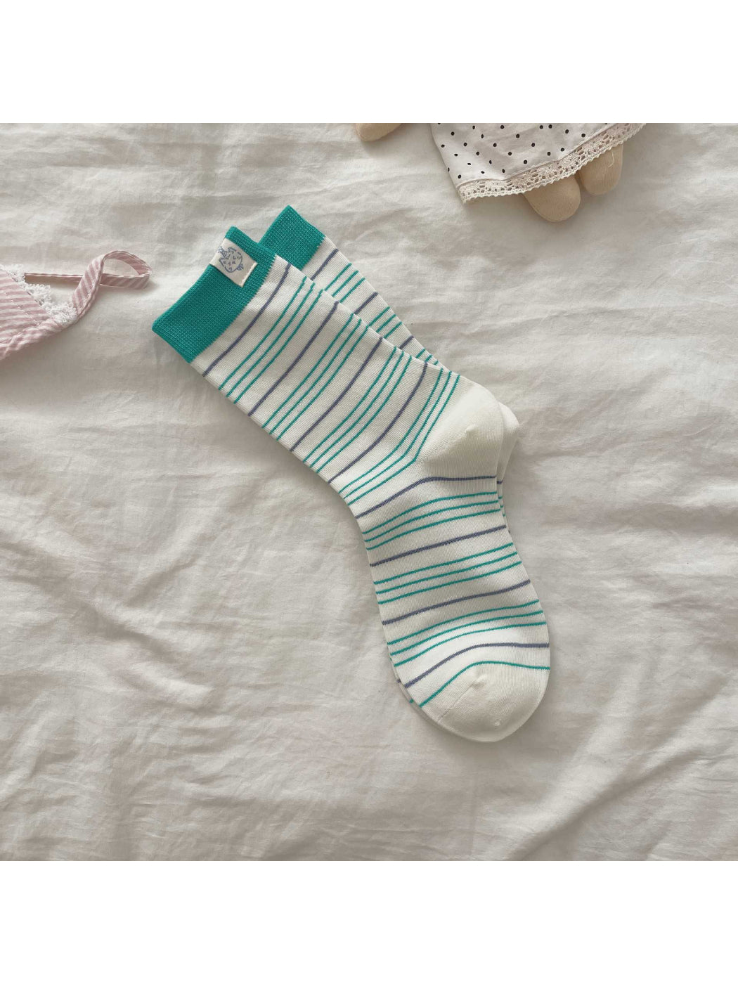 Rufia socks folded to show inside patch and soft fabric texture