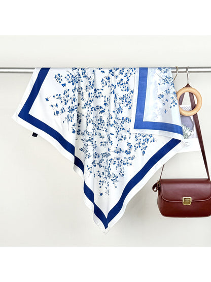 Soft Blossom Square Scarf draped over shoulders highlighting square shape and colors