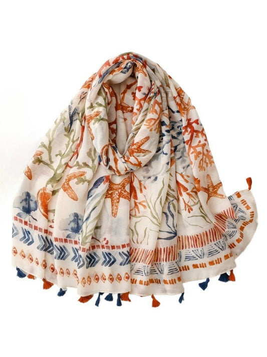 Coastal Starfish Tassel Scarf folded showing starfish pattern and tassel edges