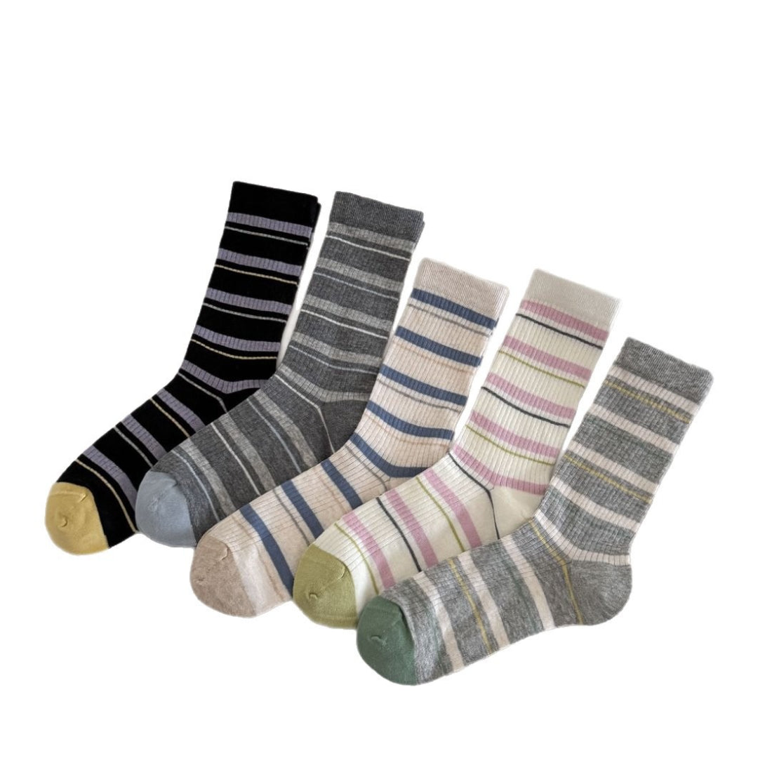 Rufia ribbed socks folded to display vibrant color stripes and ribbed fabric