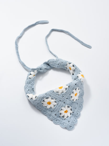 Scarvii crochet daisy smile hairband with visible crochet texture and smiley face