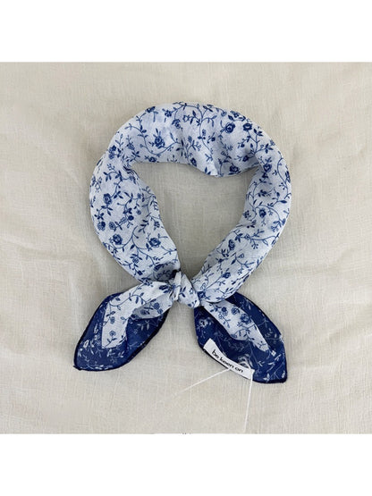 Scarvii Vintage Botanical square scarf folded to show floral print and soft fabric texture