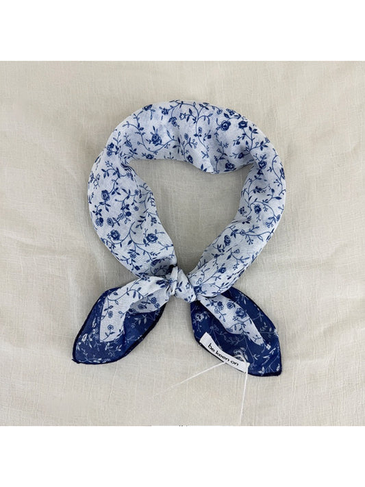 Scarvii Vintage Botanical square scarf folded to show floral print and soft fabric texture