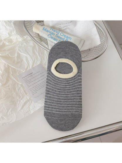Rufia striped low cut liner socks worn with casual outfit, visible ankle and stripe design