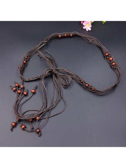 Beco Beaded Rope Tie Waist Belt showing tassel detail
