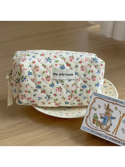 Side view of Cosbai soft corduroy floral toiletry bag highlighting and stitching details