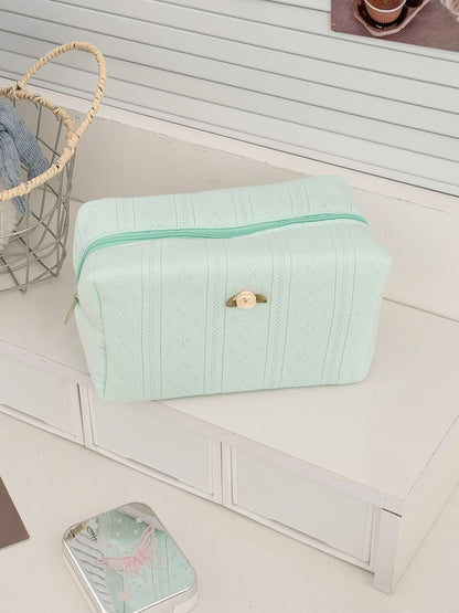 Top view of Cosbai cosmetic pouch highlighting and rose detail