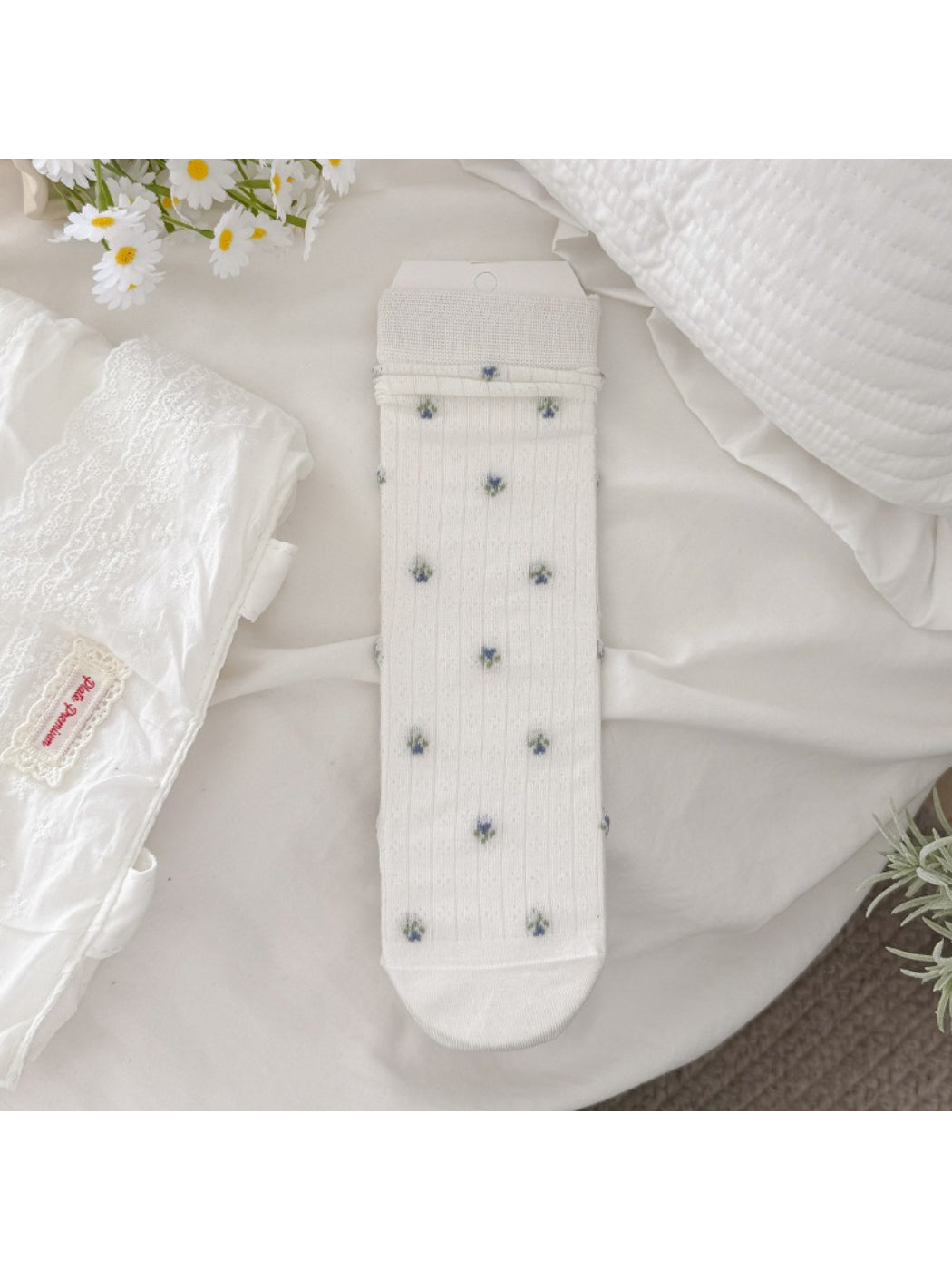 Stacked Rufia floral ribbed socks in multiple color variations