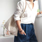 Ivory hobo bag showing shoulder strap and