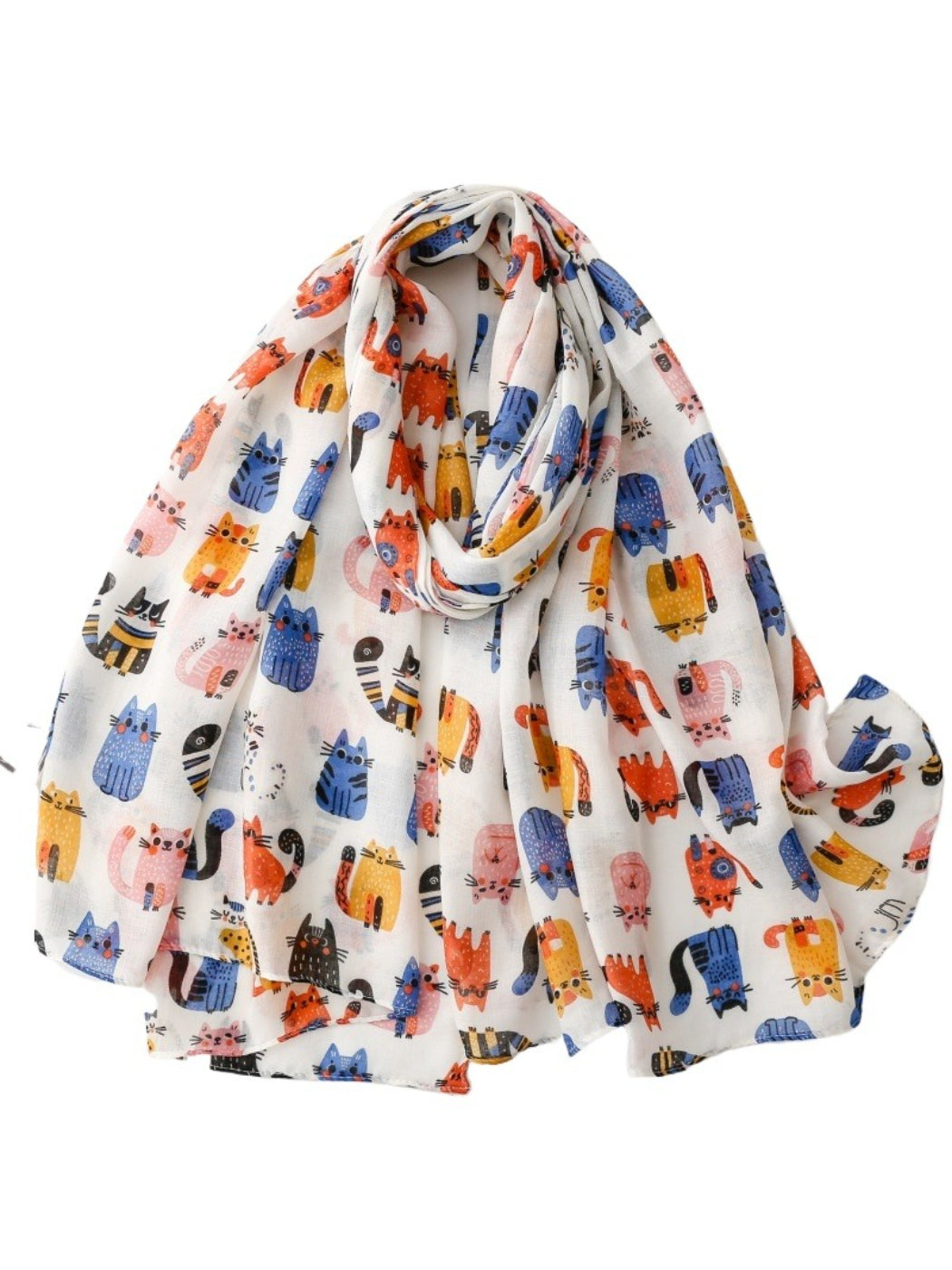 Model wearing whimsical kitty pattern scarf draped around neck with casual outfit