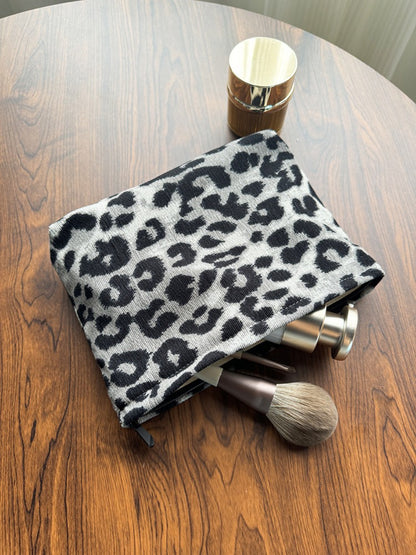 Cosbai flat pouch open with leopard print interior lining visible