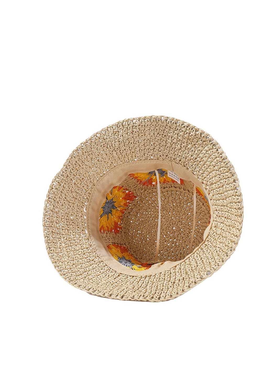 Haila bucket hat folded to show texture and flower patch detail