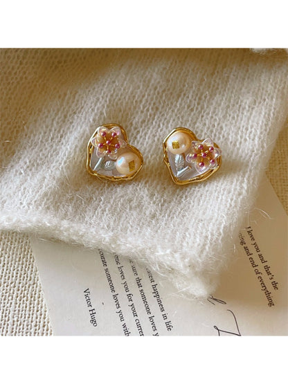 Earwish Romantic Floral Heart Earrings displayed on a white jewelry stand