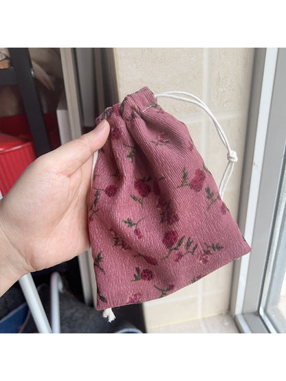 Cosbai Floral Pouch with detailed flower illustrations on fabric